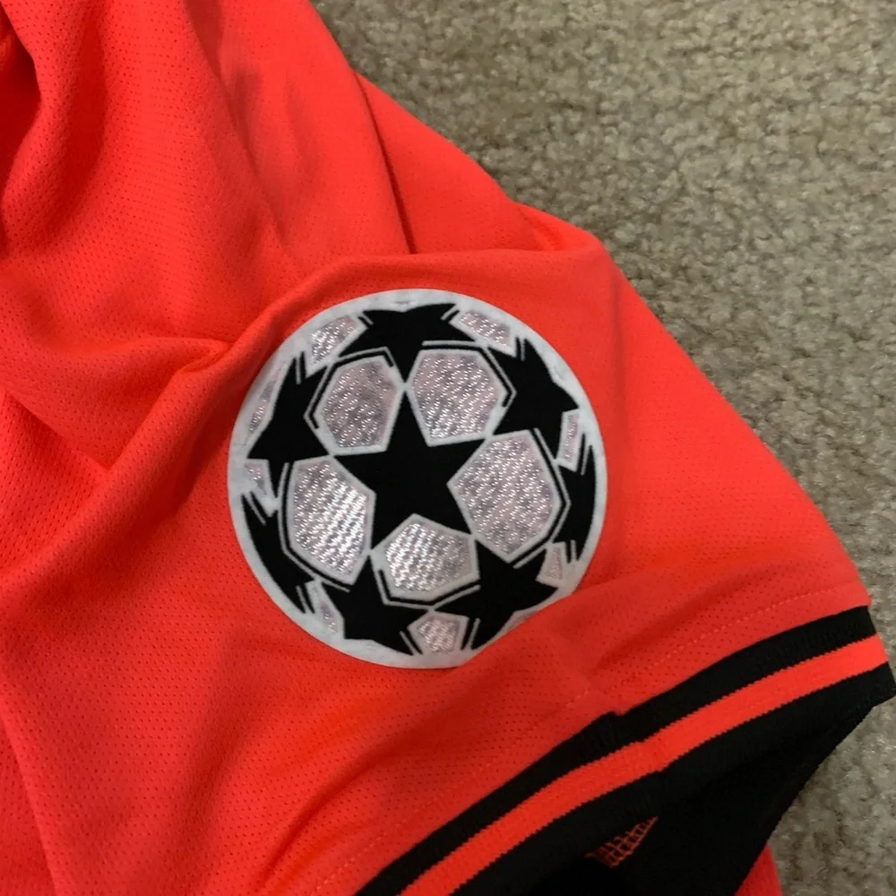 Jordan Men’s Mbappé #7 Short Sleeve Jersey - Neon Coral with Black Accents